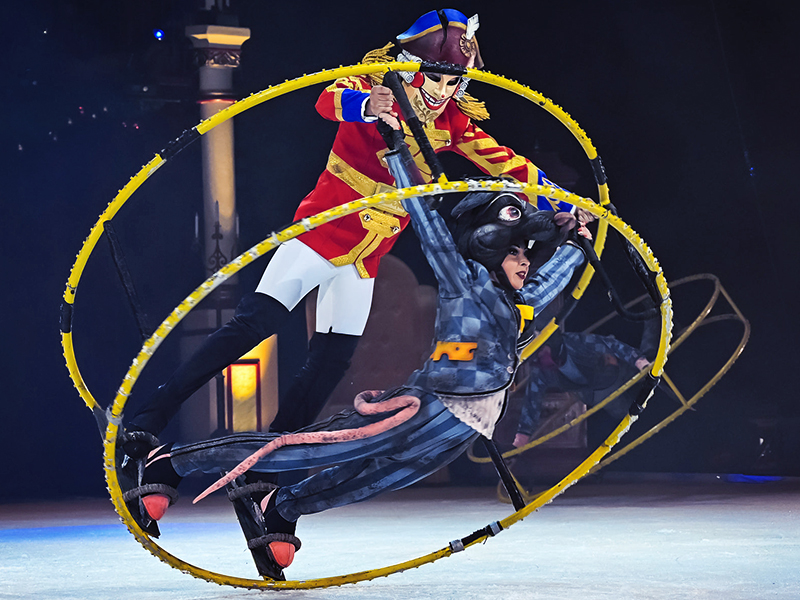 Nutcracker spining mice on german wheel. The Nutcracker by Moscow circus on ice